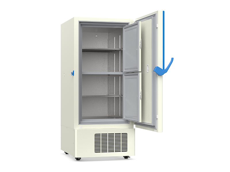 White refrigerator with open doors on a white background