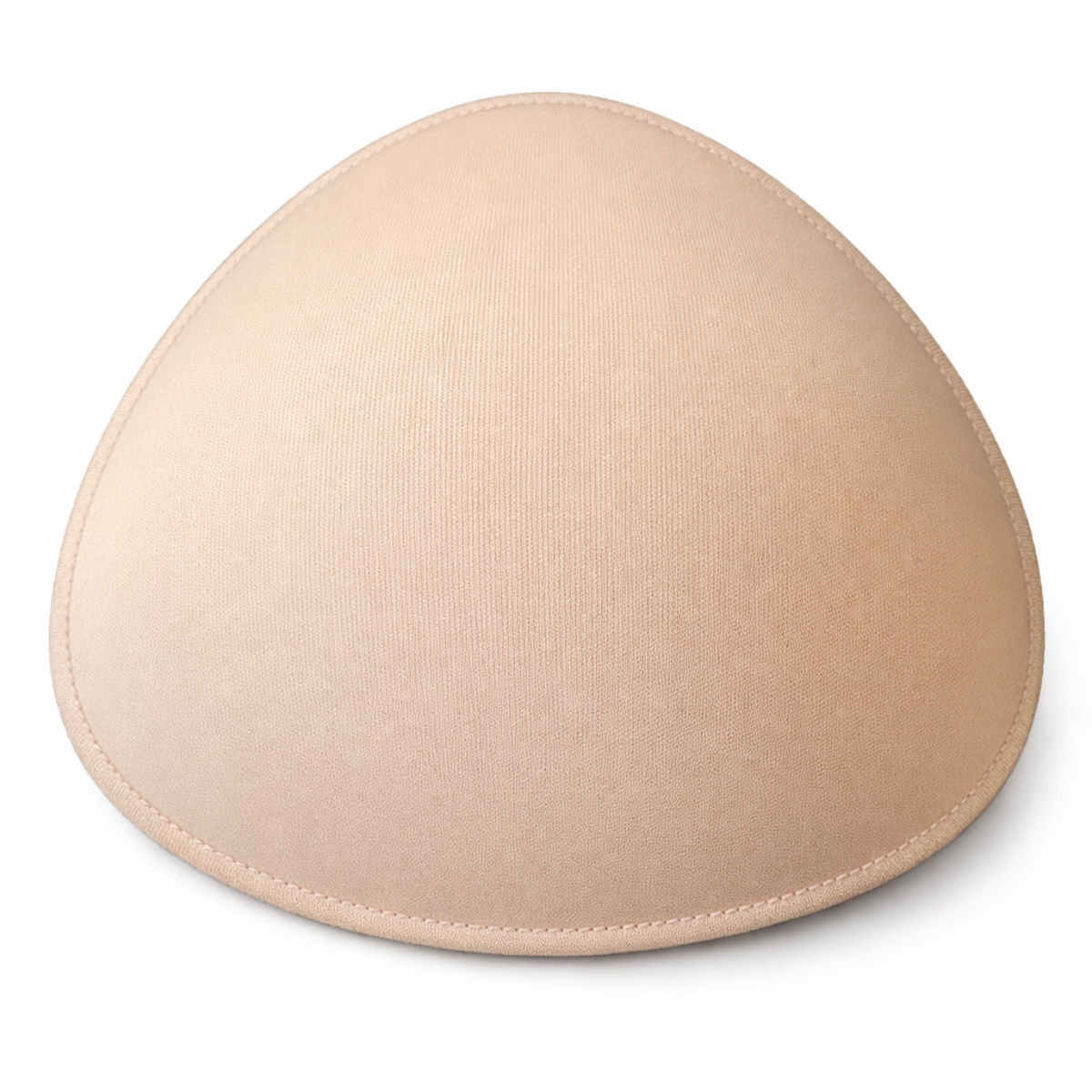 Beige bra pad on a white background