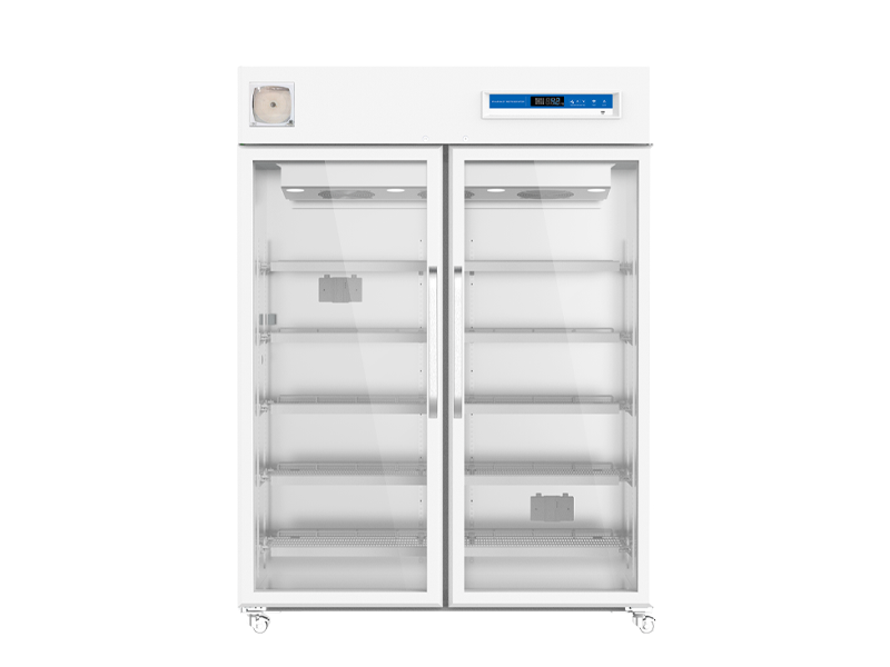 Commercial refrigerator with double doors on a white background