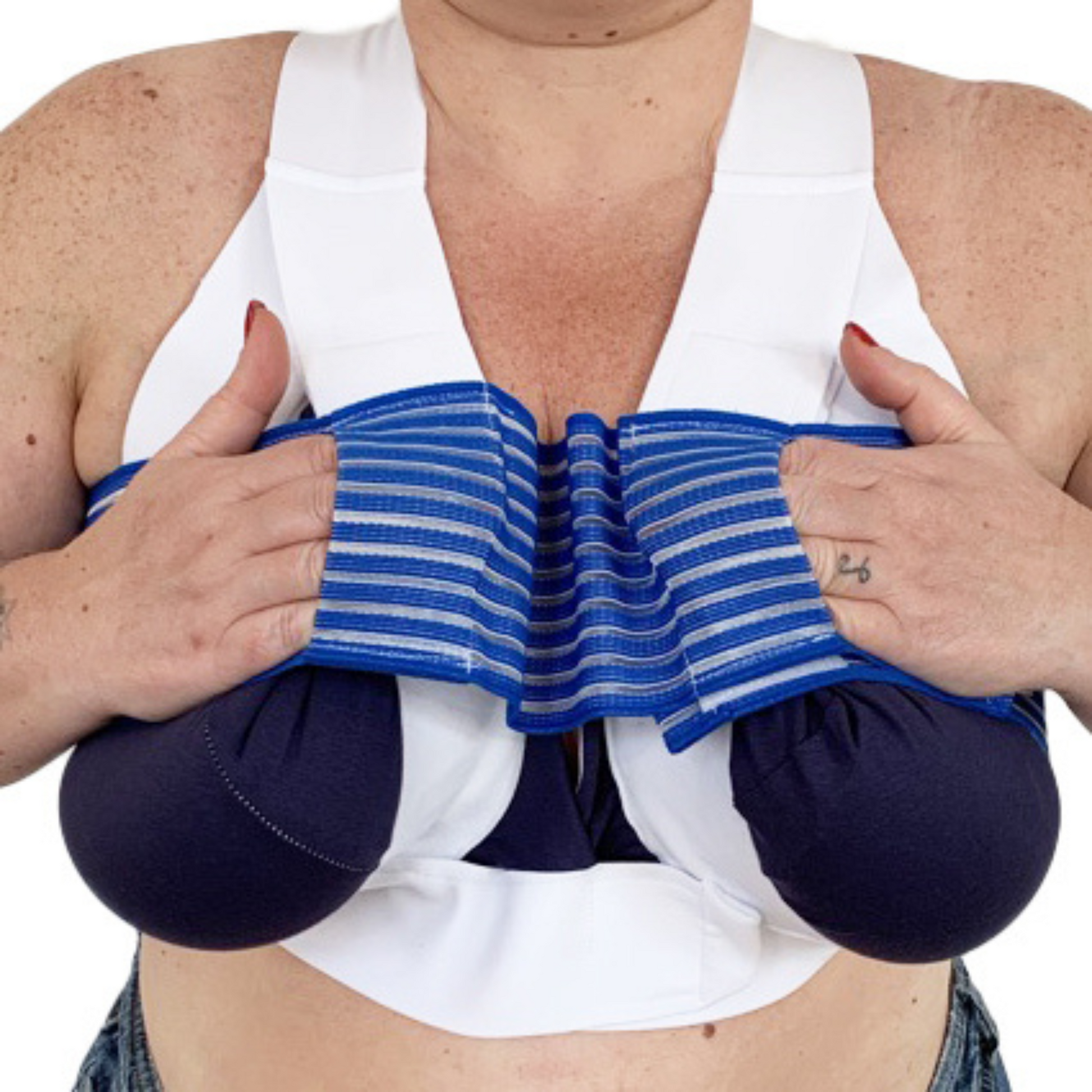 Person wearing a white tank top with a blue compression garment over it on a white background