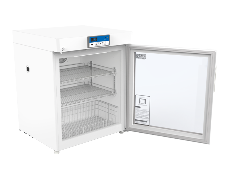 White laboratory refrigerator with open door on a white background